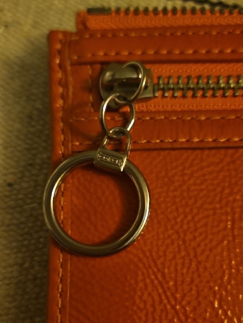 Coach Orange Poppy Patent Zippy Wallet/Wristlet with Silver Plaque - Picture 3 of 8